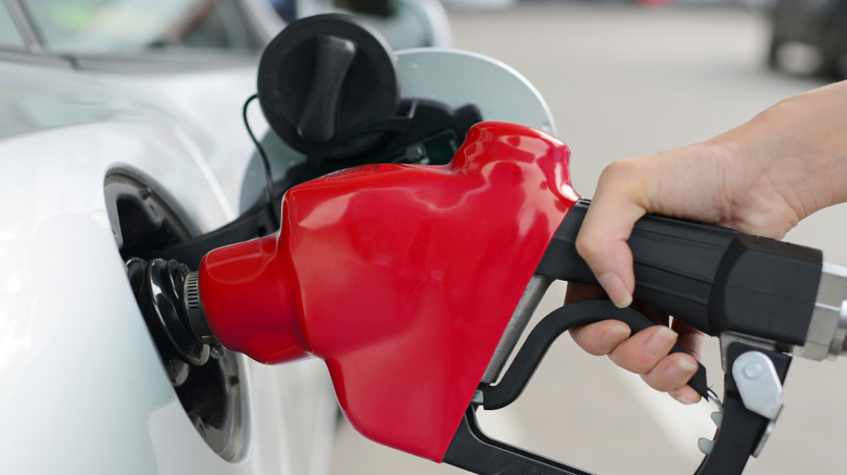 Car with a gas cap holder