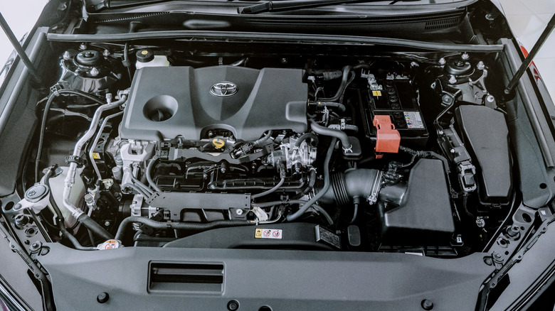 View of the engine compartment in a Toyota Camry.