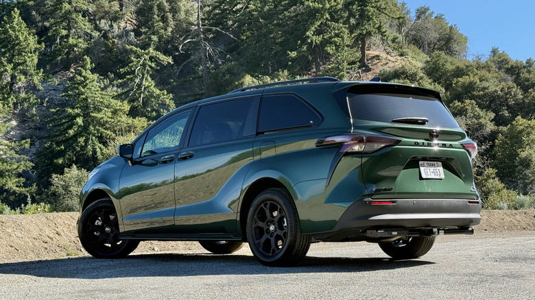 2026 Toyota Sienna Woodland Edition rear 3/4 parked in the mountains