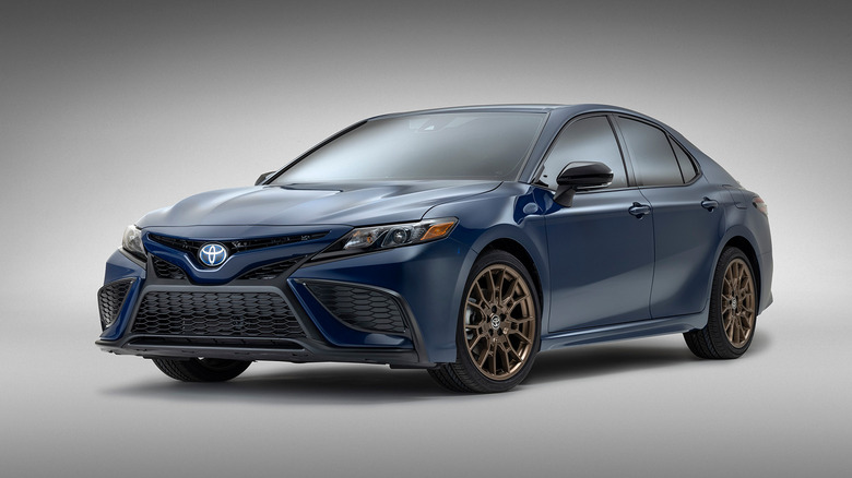 A blue 2023 Toyota Camry Hybrid