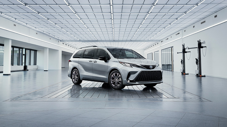 A white 2023 Toyota Sienna parked in a garage