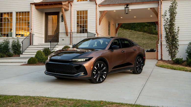 A bronze 2025 Toyota Crown parked on a driveway