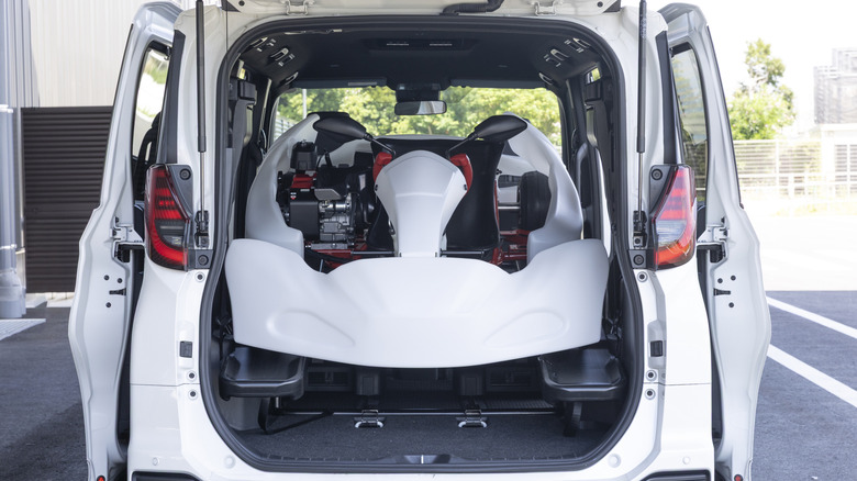GR Kart loaded into Toyota Novy Minivan for transport