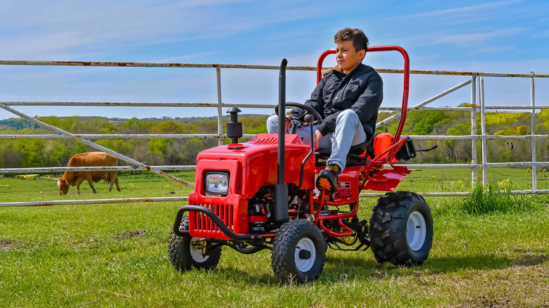 Young rider with the Massimo mini tractor go kart