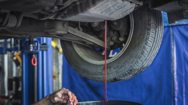 Draining transmission fluid at a shop