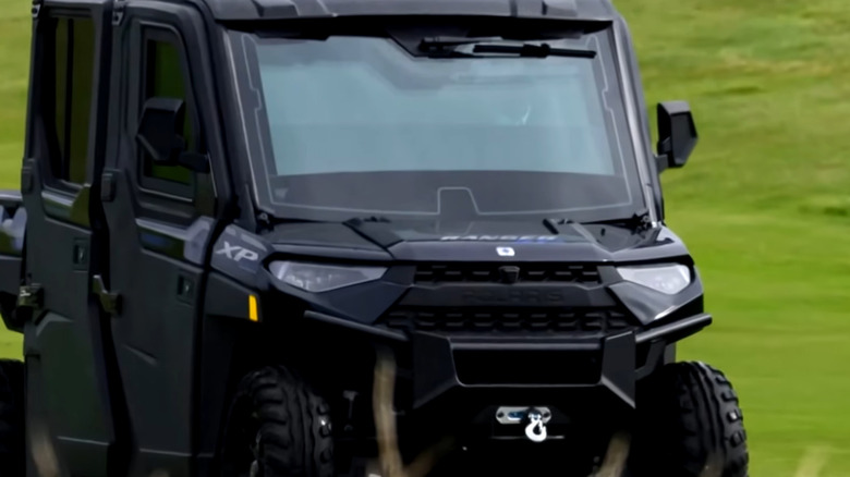 front of Golf Force One shows armored window