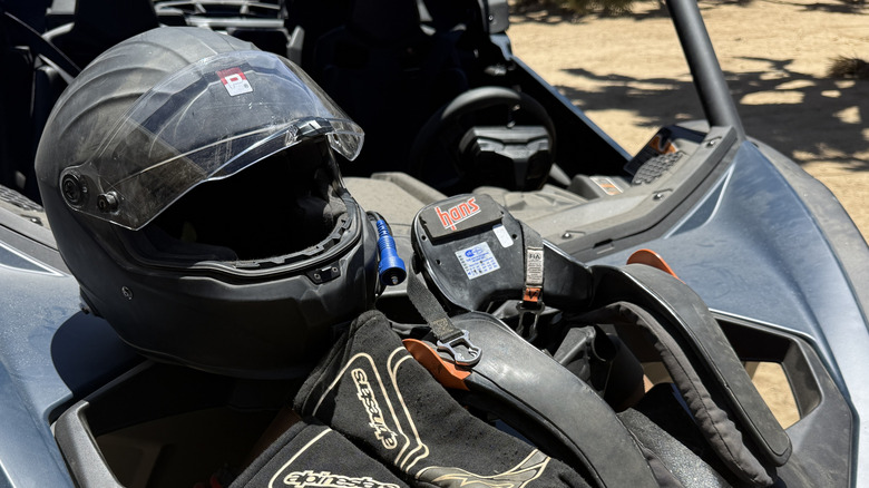 2026 Can-Am Maverick X3 with Snell helmet, Hans and gloves.