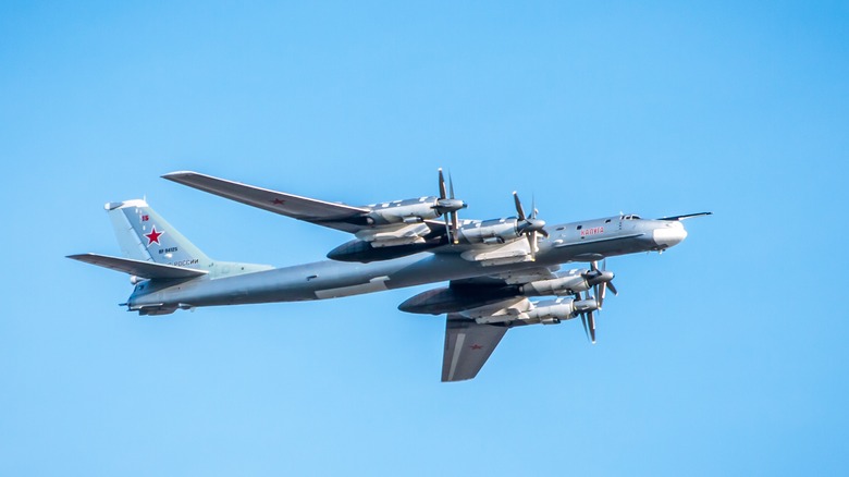 A Tu-95 bomber airplane in flight