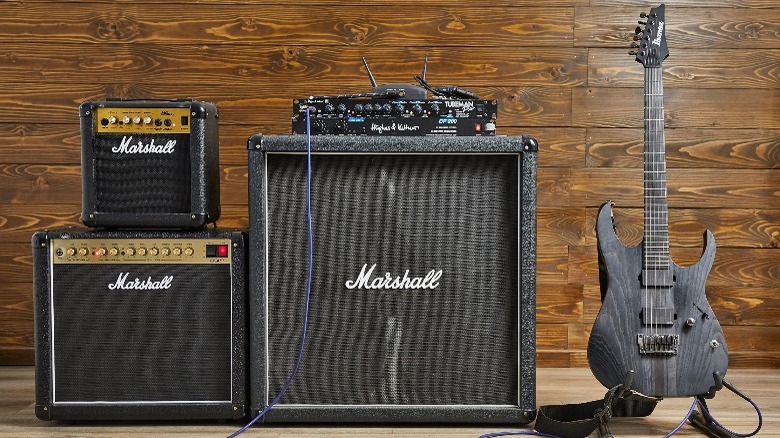 Marshall amps next to an Ibanez electric guitar