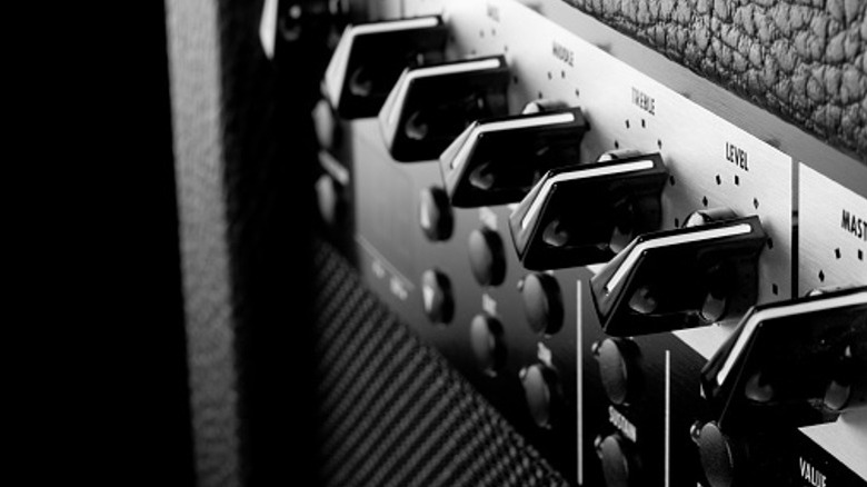 tone and effect knobs on guitar amplifier
