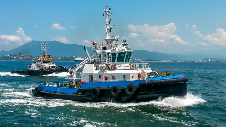 Tugboats operating near a bay