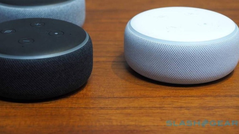 Amazon Echo Dots on desk 