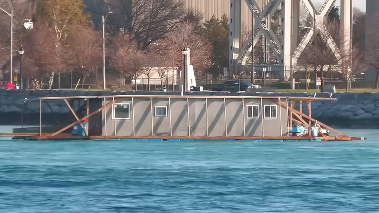 A houseboat floating on the St. Clair River.