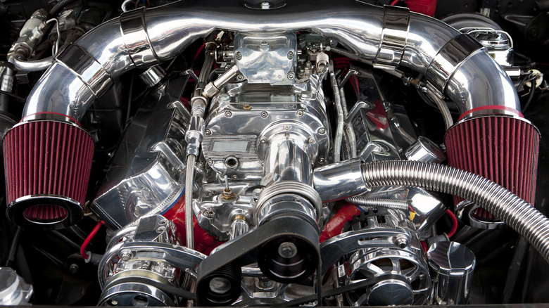 Supercharged engine with twin air intakes