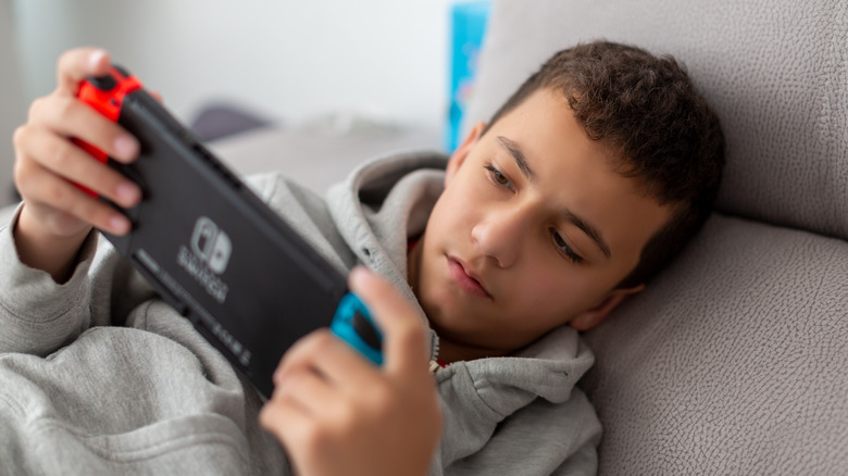 boy playing switch