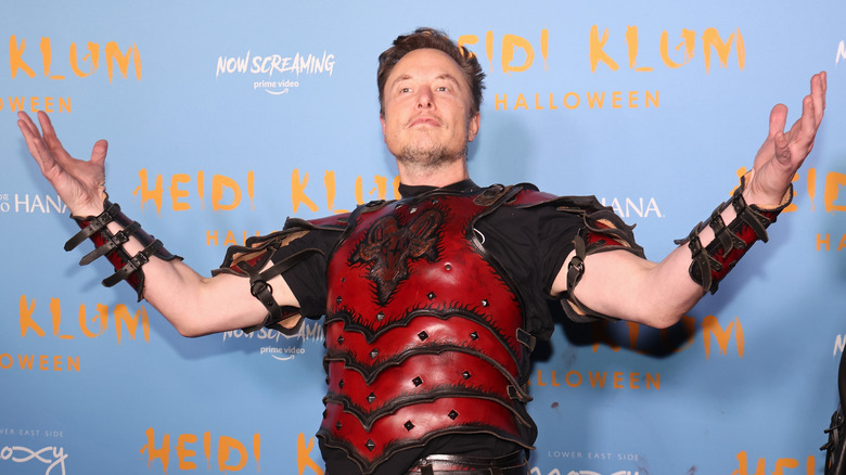 Elon Musk in a Halloween costume at an event in 2022