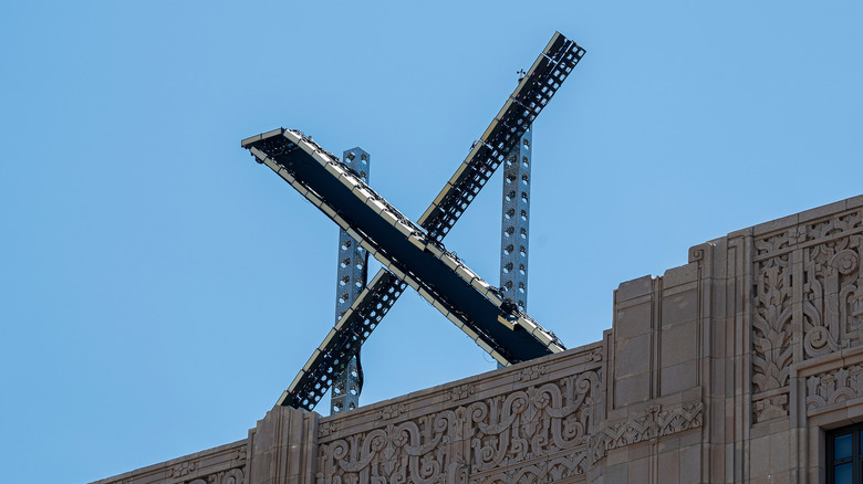 X sign Twitter headquarters