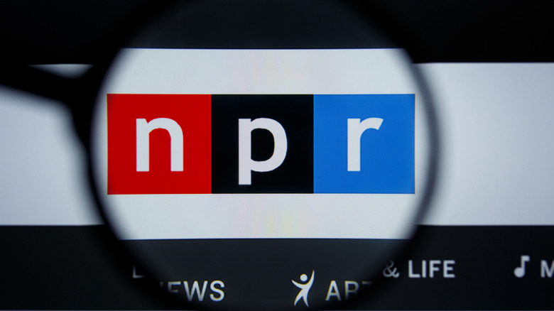 Magnifying glass over NPR logo