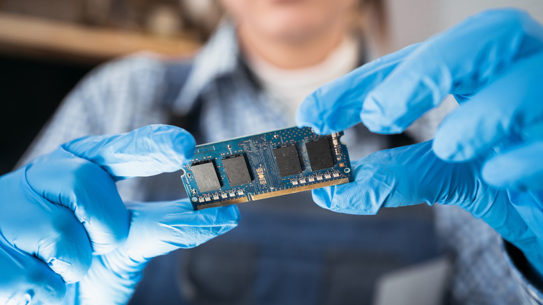 Person holding a DRAM module