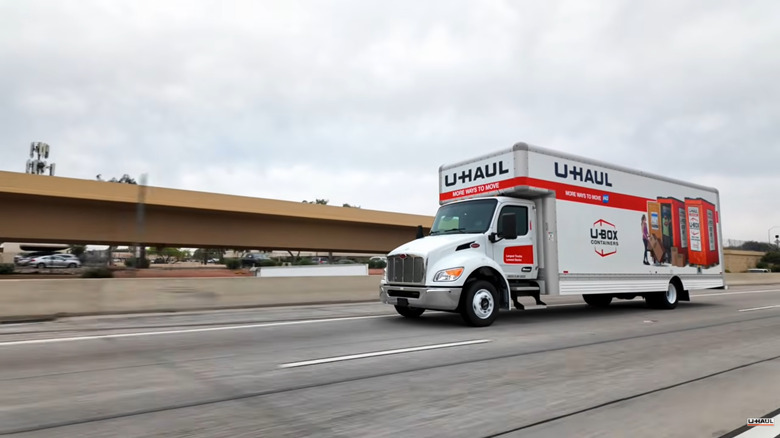 U-Haul Easy Mover "EM" Peterbilt 29-foot moving truck moving down the highway