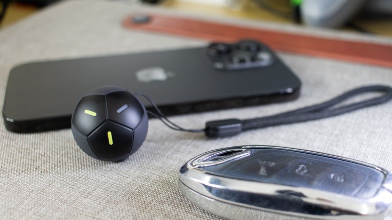 the FineTrack 2 with an iPhone and a car key