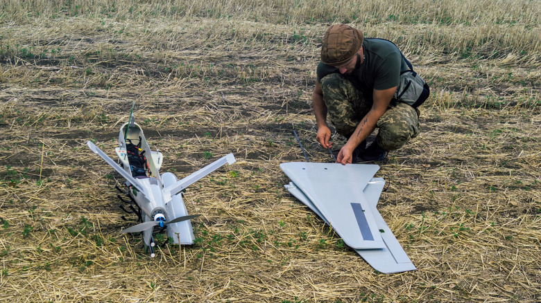 Ukranian soldier deploys a drone
