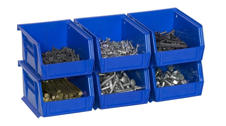 stacking storage bins with nails in it