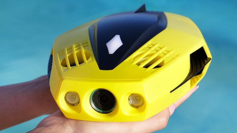 The Chasing Dory drone held in a person's hands