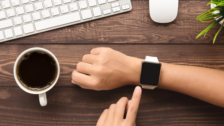 Person using apple watch