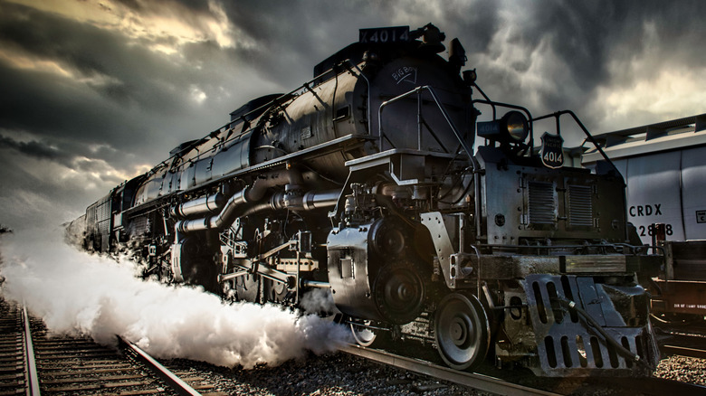 Union Pacific's Big Boy No. 4014 under steam with a dramatic sky behind it