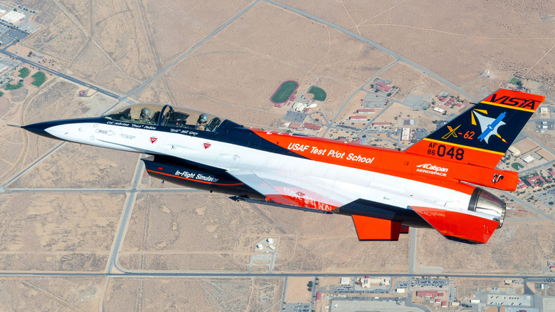 The VISTA X-62 AI jet flies over barren landscape