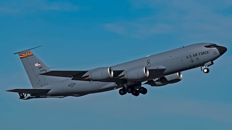 Side view of U.S. Air Force KC-135R tanker taking off.