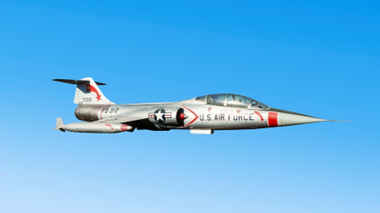 Lockheed F-104 Starfighter in level flight against a blue sky