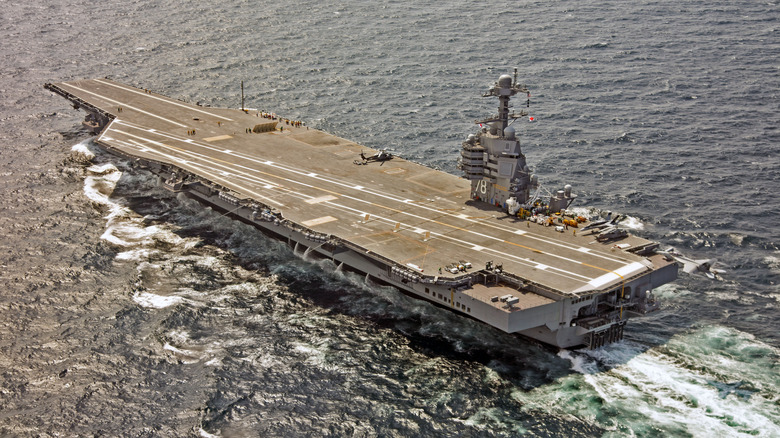 Ford-class aircraft carrier the USS Gerald R. Ford seen from an overhead oblique angle, and underway