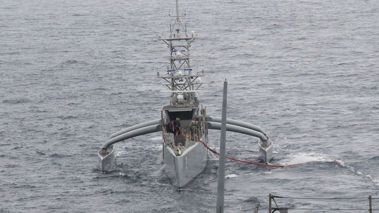 A Seahawk drone at sea approaching the USS Chafee