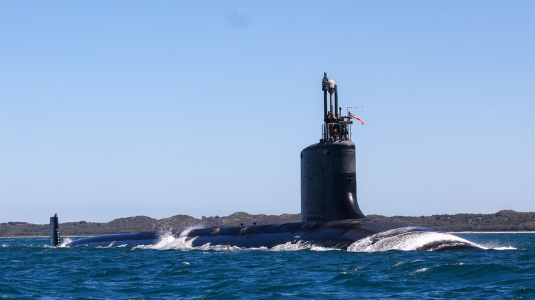 USS Minnesota submarine on ocean surface off the coast of Australia.