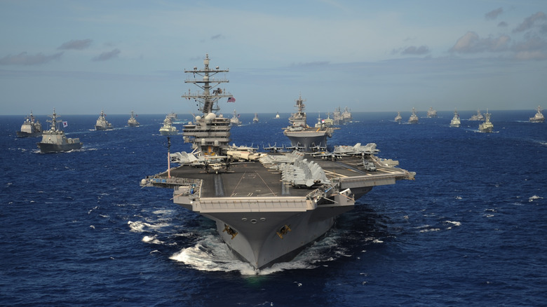 The USS Ronald Reagan leads ships at sea