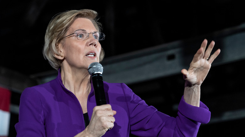 Elizabeth Warren speaking into microphone 