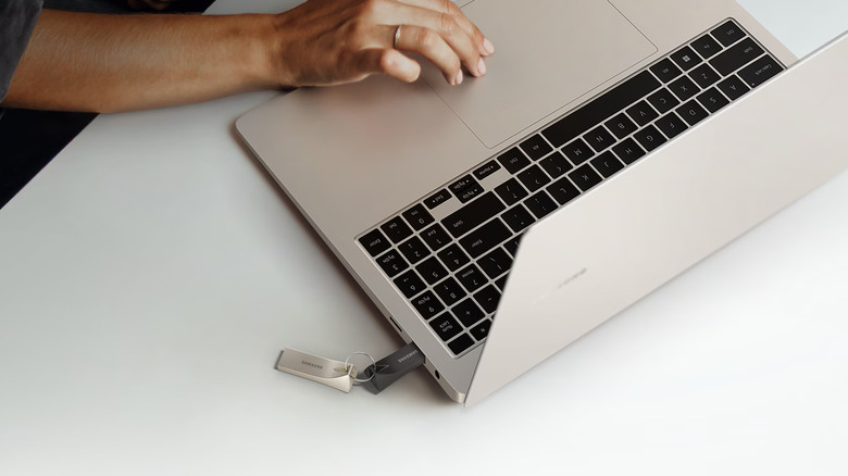 Flash drive connected to a laptop