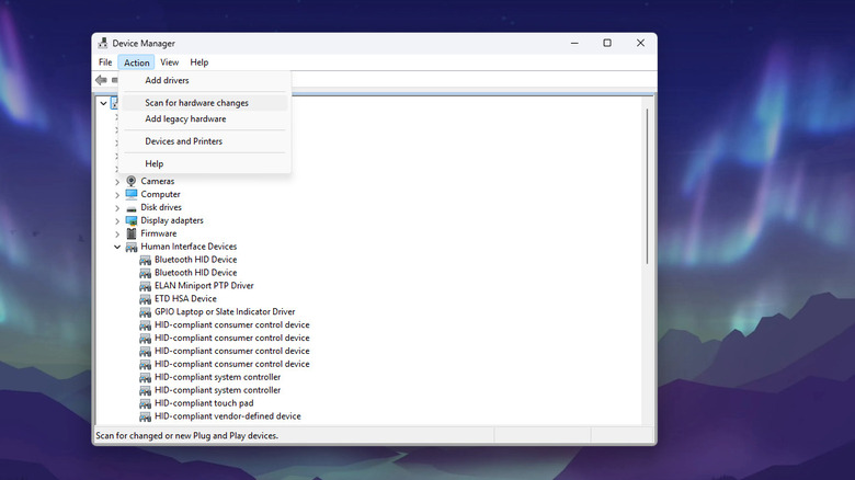 Windows Device Manager showing Scan for hardware changes option