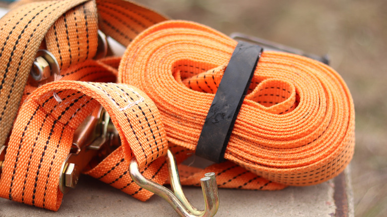 Wound ratchet stap beside unwound strap