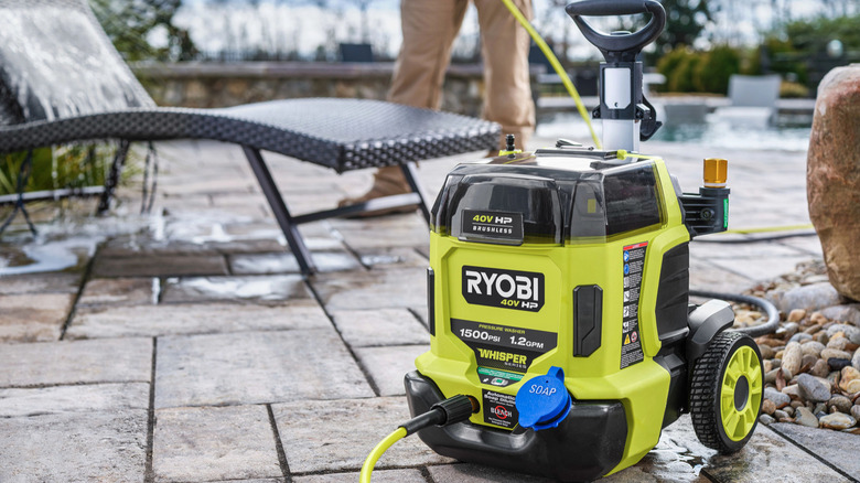 40V Ryobi pressure washer being used on patio