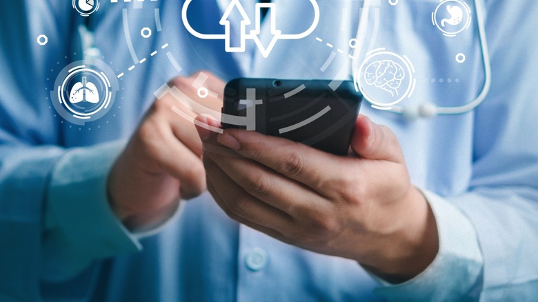 A person viewing workout stats on a smartwatch