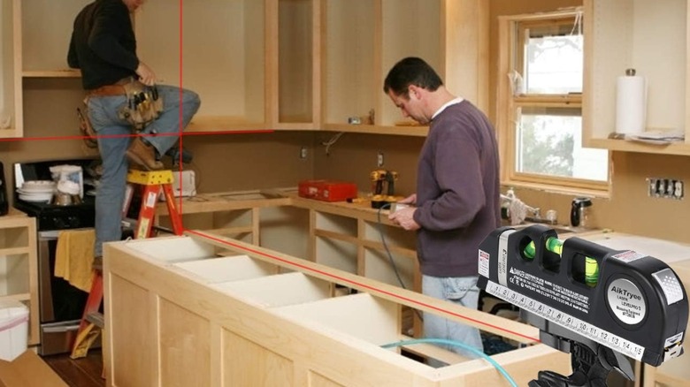 AikTryee Laser Level Line Tool being used in a kitchen