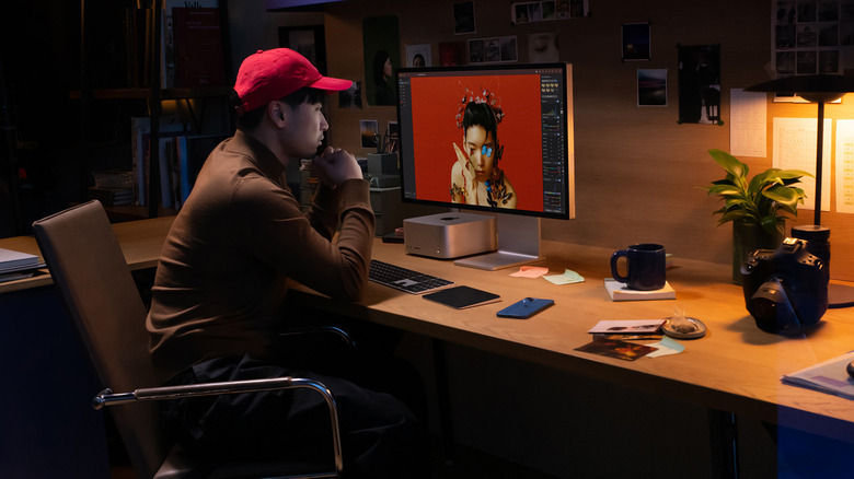 Man using Apple Studio Display