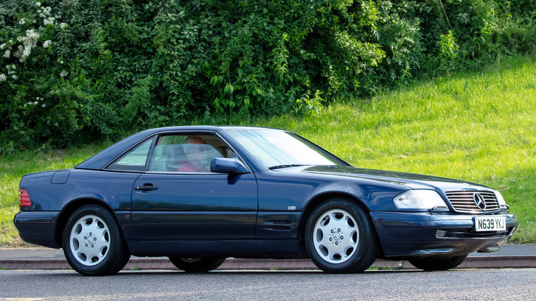 Side shot of a blue Mercedes-Benz SL R129