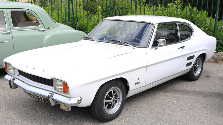 White Ford Capri in parking lot