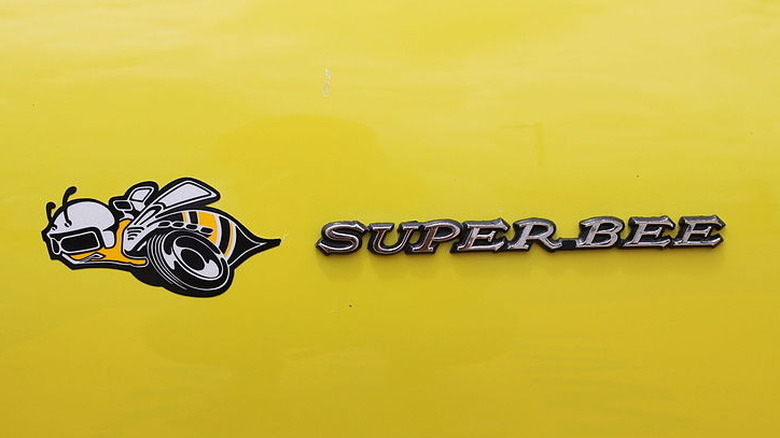 Dodge Super Bee logo on Yeloow Dodge muscle car