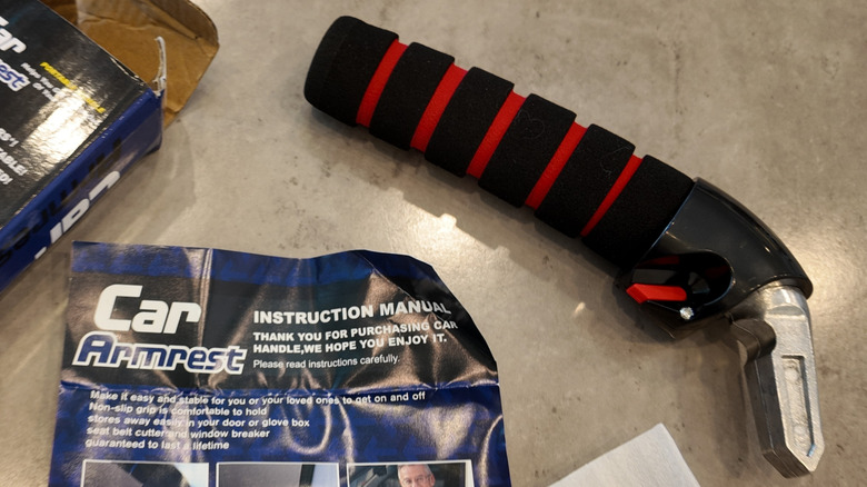 portable door handle on table with box