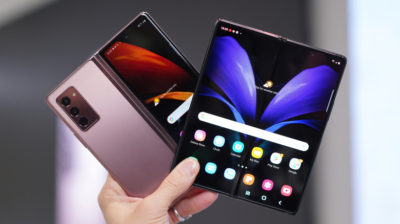 Samsung foldable phones in hand